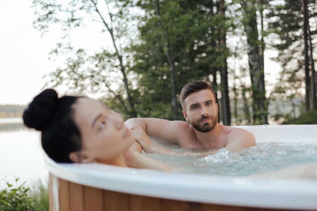 swinger couple in hot tub