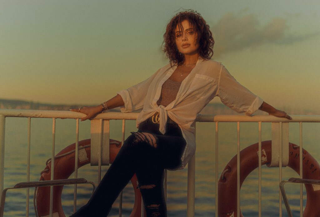 Woman posing on swinger cruise deck