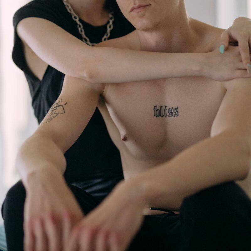 Couple embracing on bed