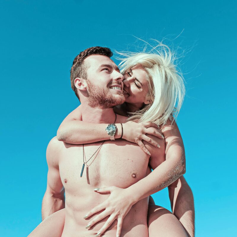 Smiling swinger couple