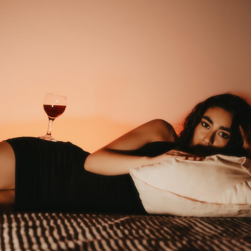 Brunette Woman Lying on Bed