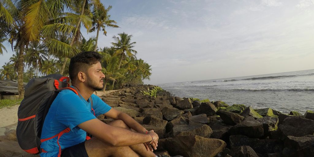 man watching sea waves