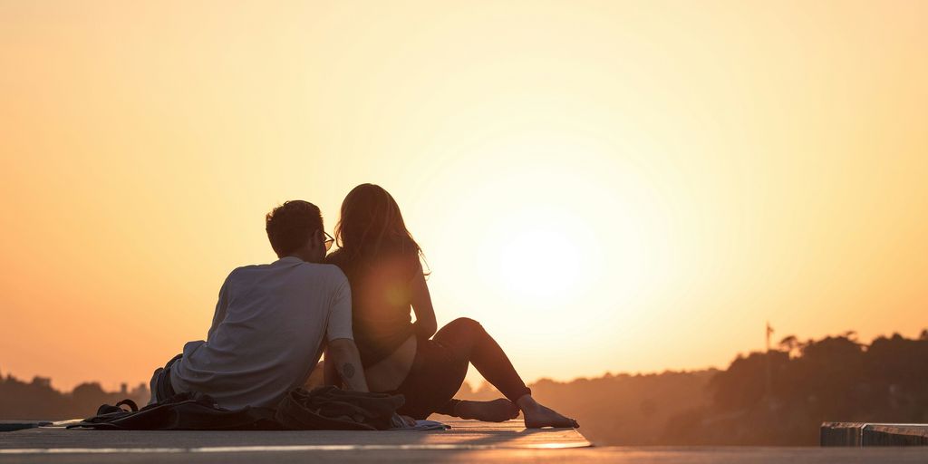 couple watching sun set 