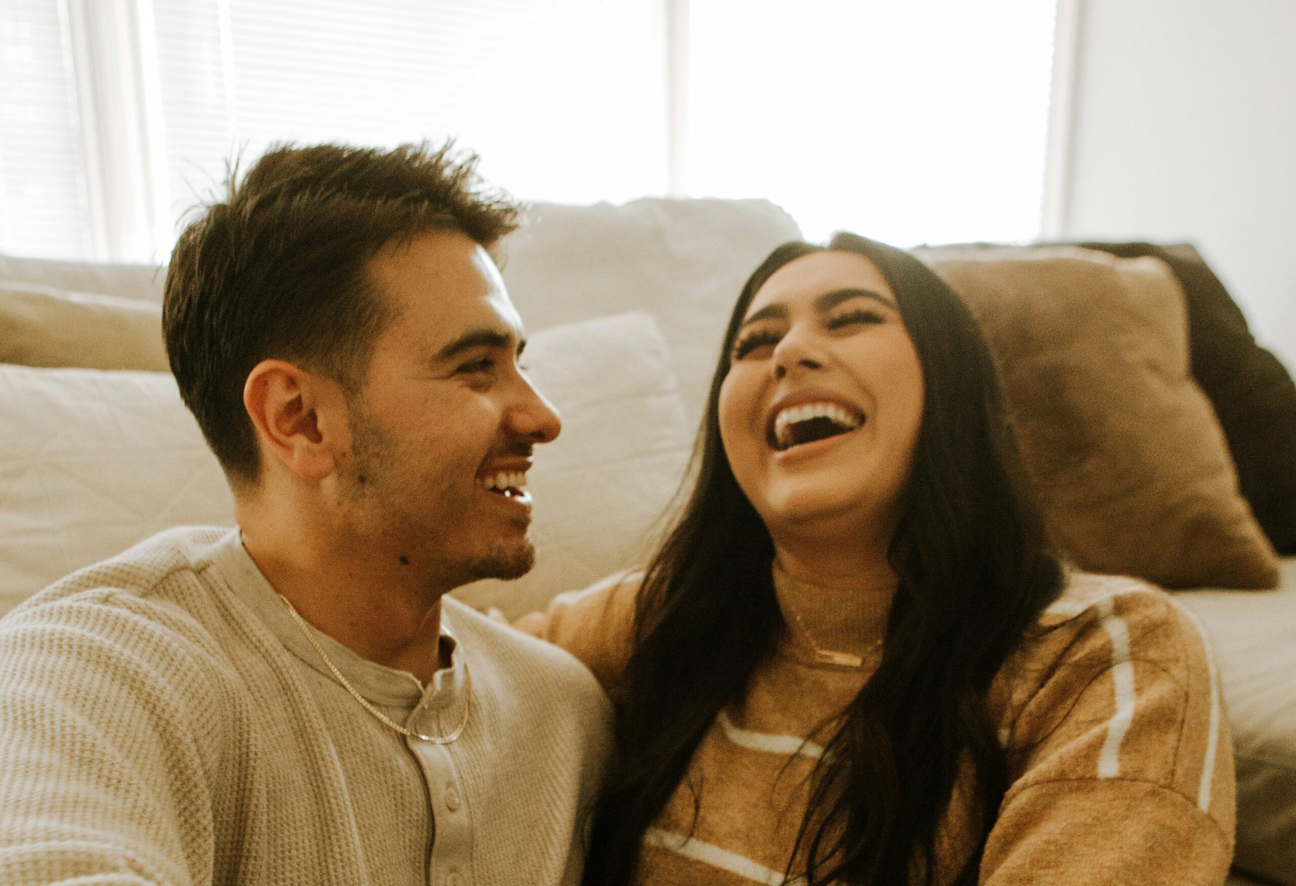 a man and woman laughing