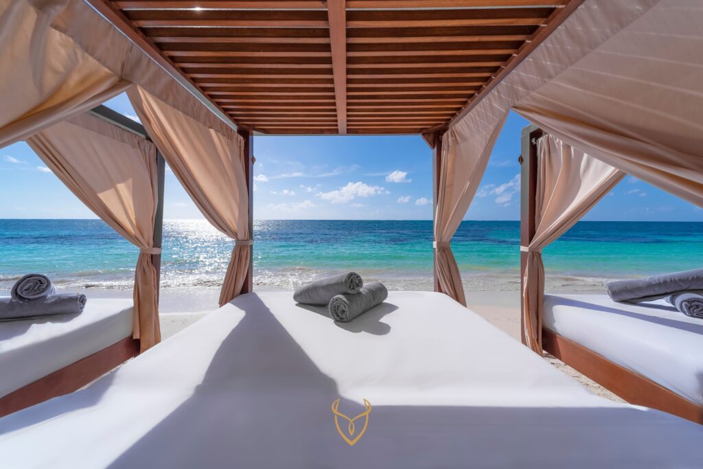 Picture of oceanfront balinese beds at Desire Riviera Maya Resort