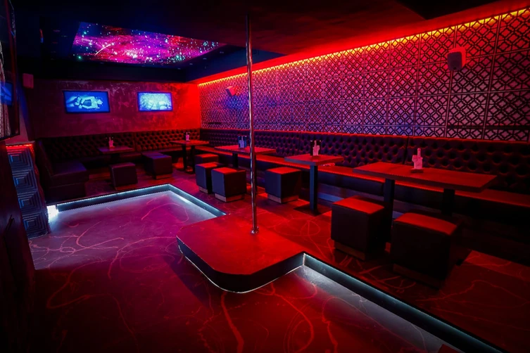 red light black tables and chairs