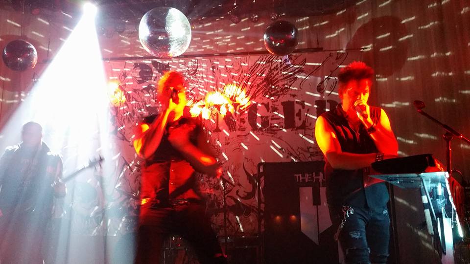 image of a man singing in the Numbers Nightclub