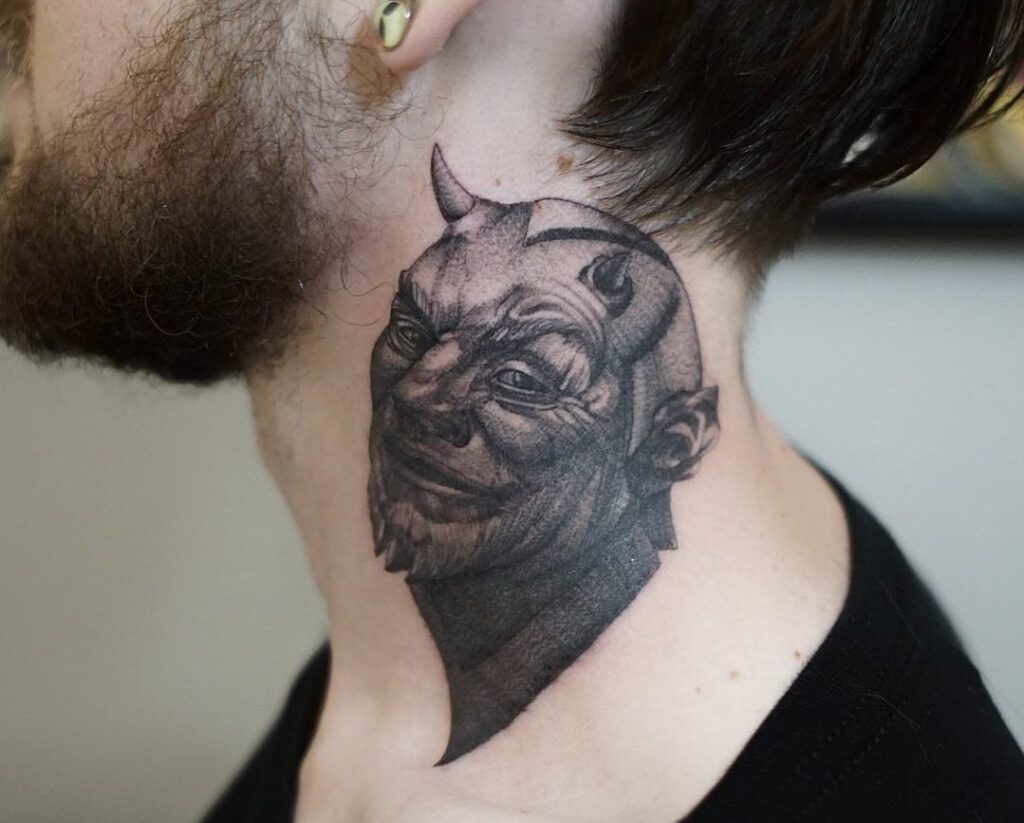 An image of a tattoo in the man's neck