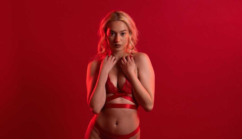 A woman wearing red lingerie