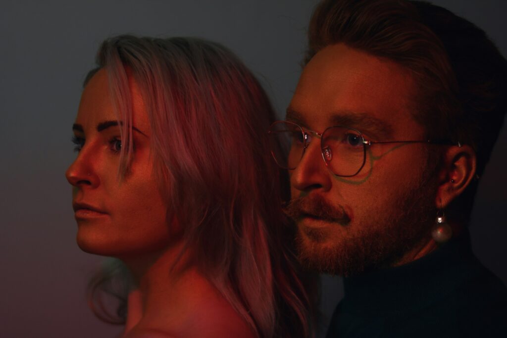 shallow focus photo of man wearing eyeglasses