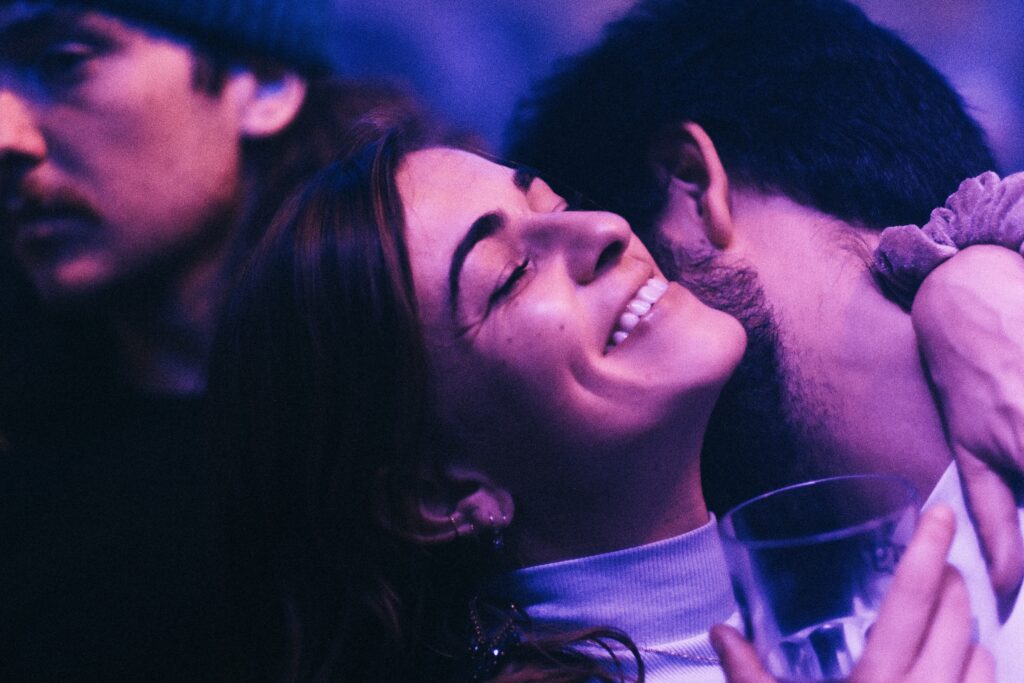 a couple of people that are hugging each other