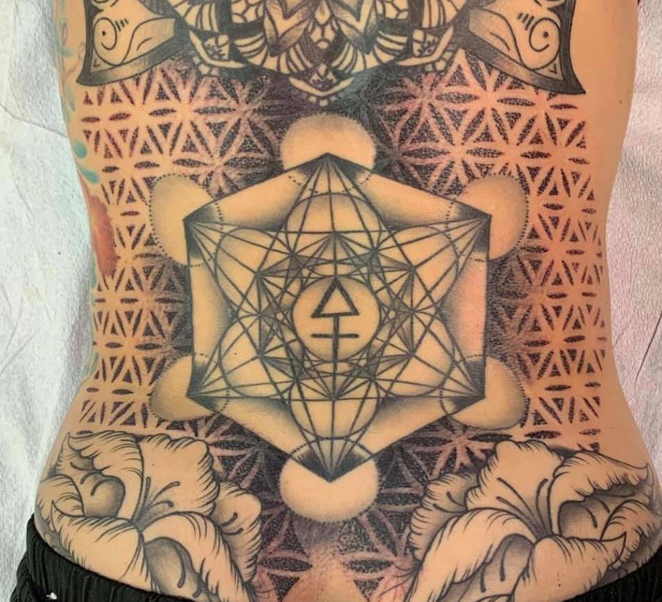 An image of a tattoo in the woman's back