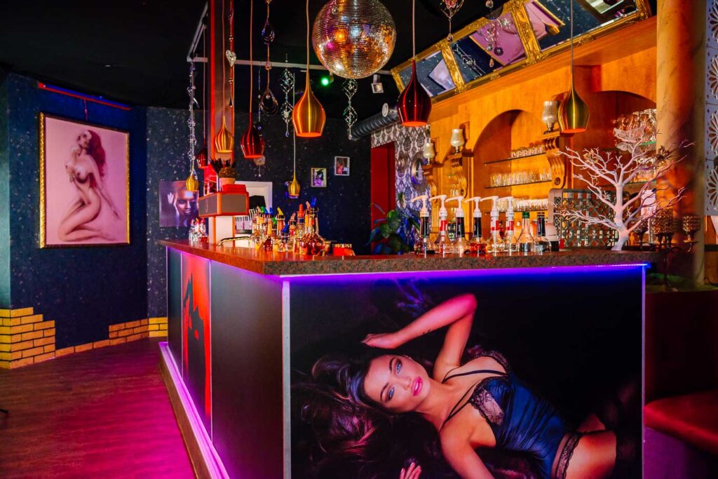 Bar counter in the club with chandelier