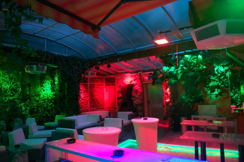 Sofa and table with lights in the club
