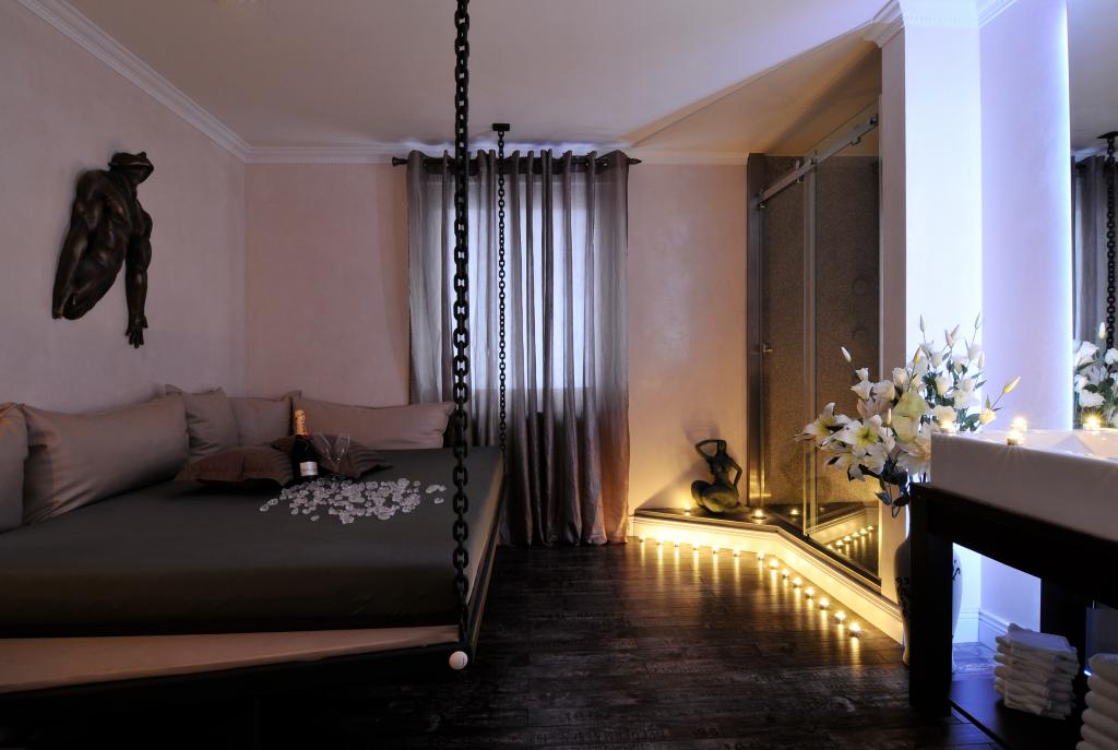 Master bedroom with lights and wine