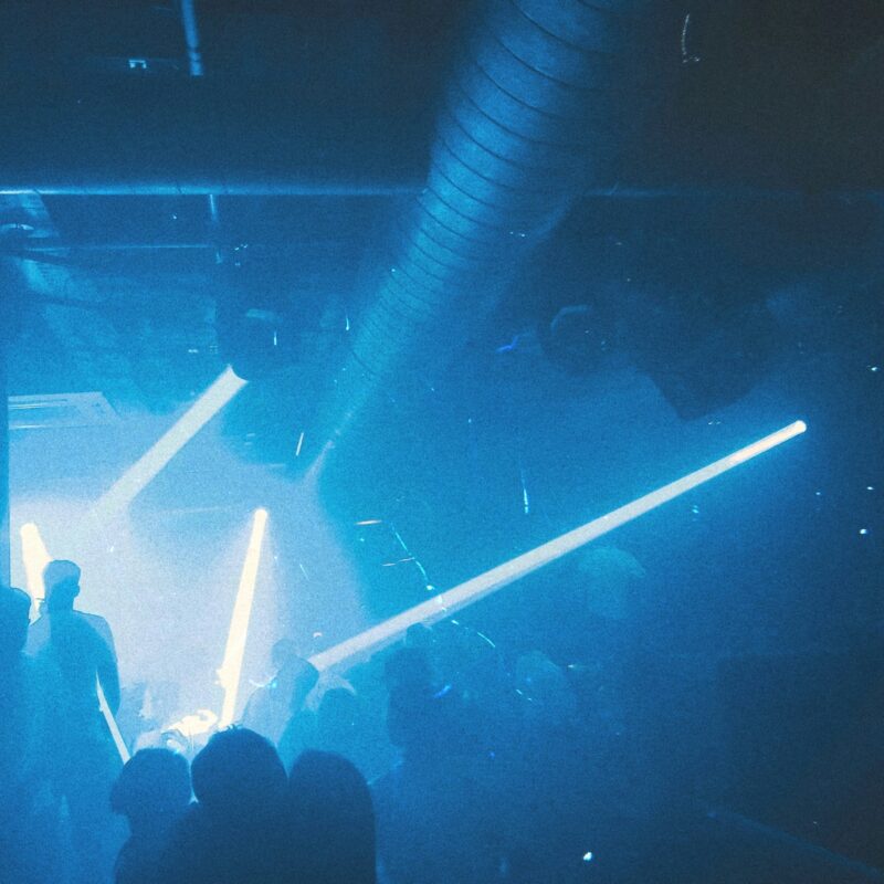 people standing on stage during nighttime