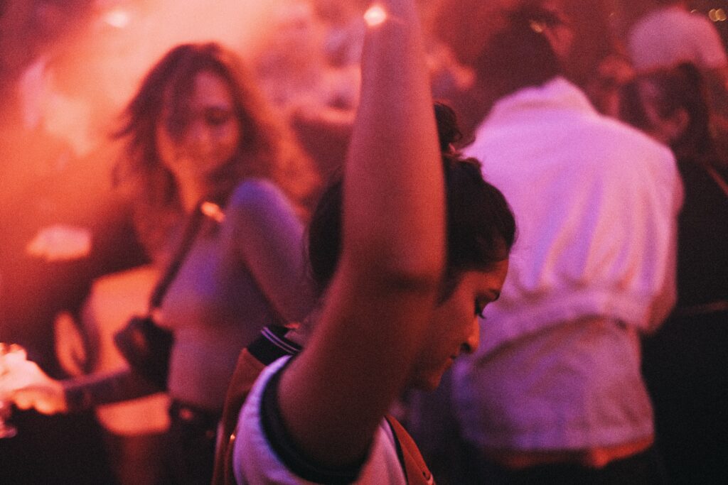 A woman dancing in the crowd