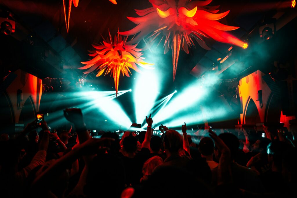 People are dancing and singing in the party