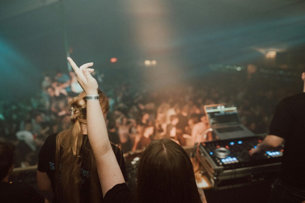 Woman DJ in the club playing music