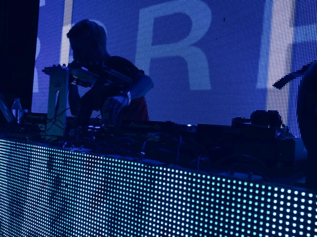 DJ playing music in the stage