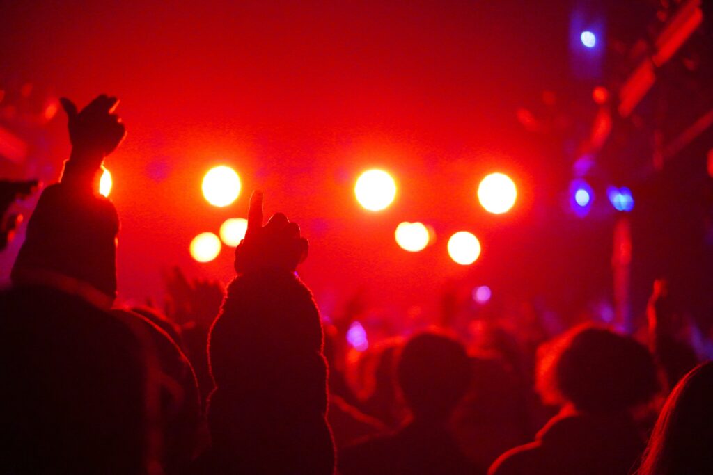 Silhouette of people standing in the club