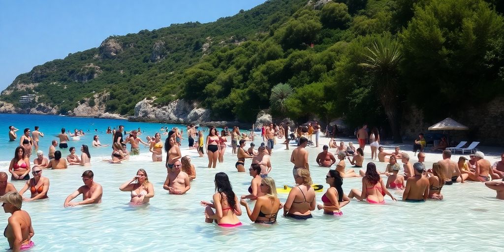 People sunbathing on a beautiful nude beach in Greece