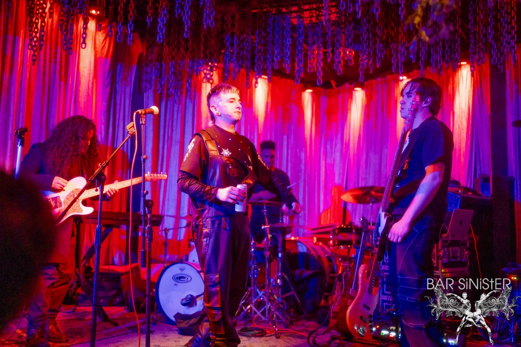 The band performing in the stage