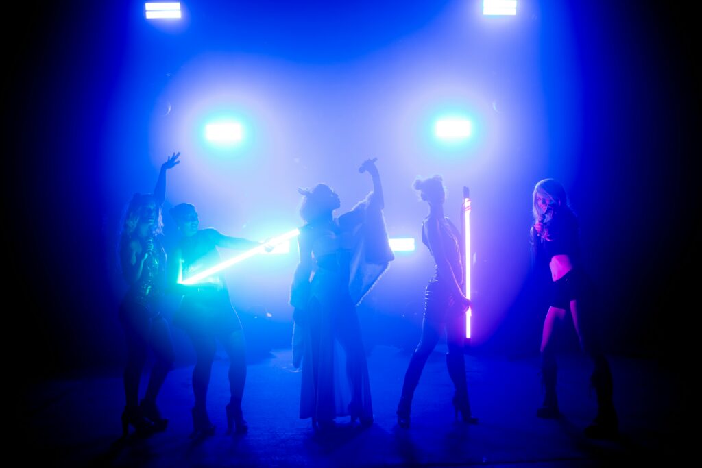 Girl band performing in the stage