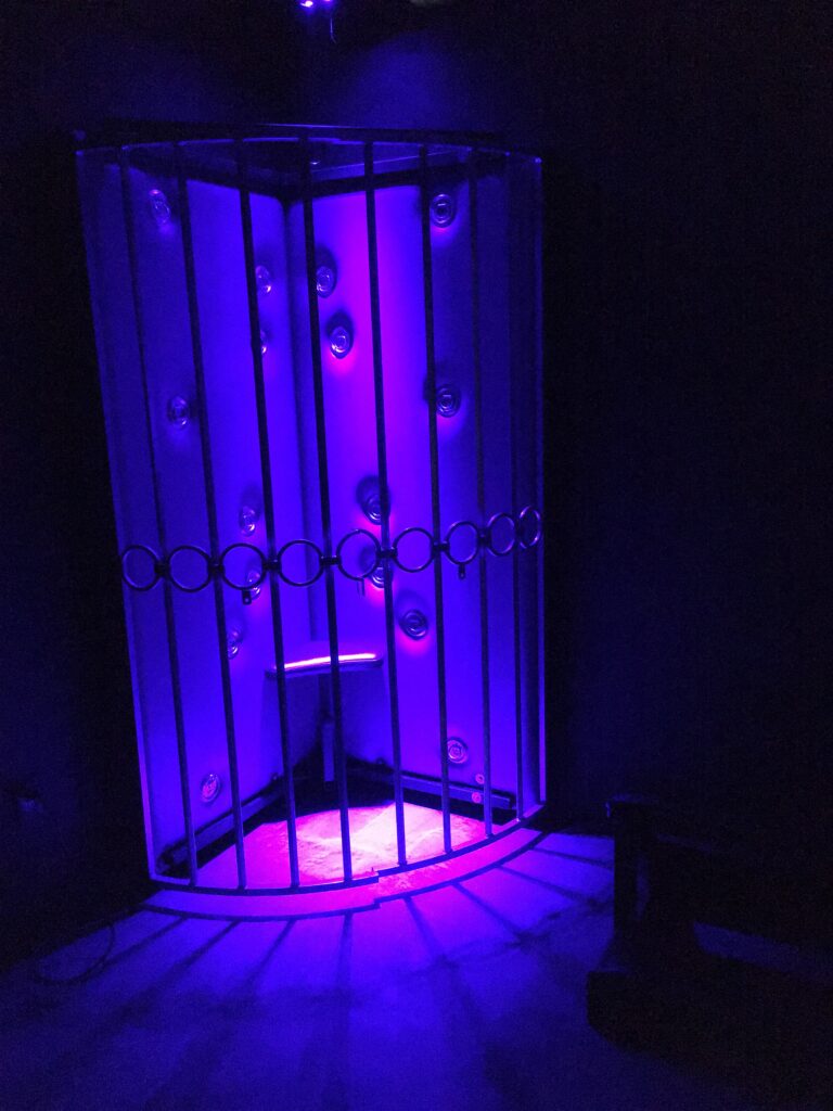 cage with lights in the room