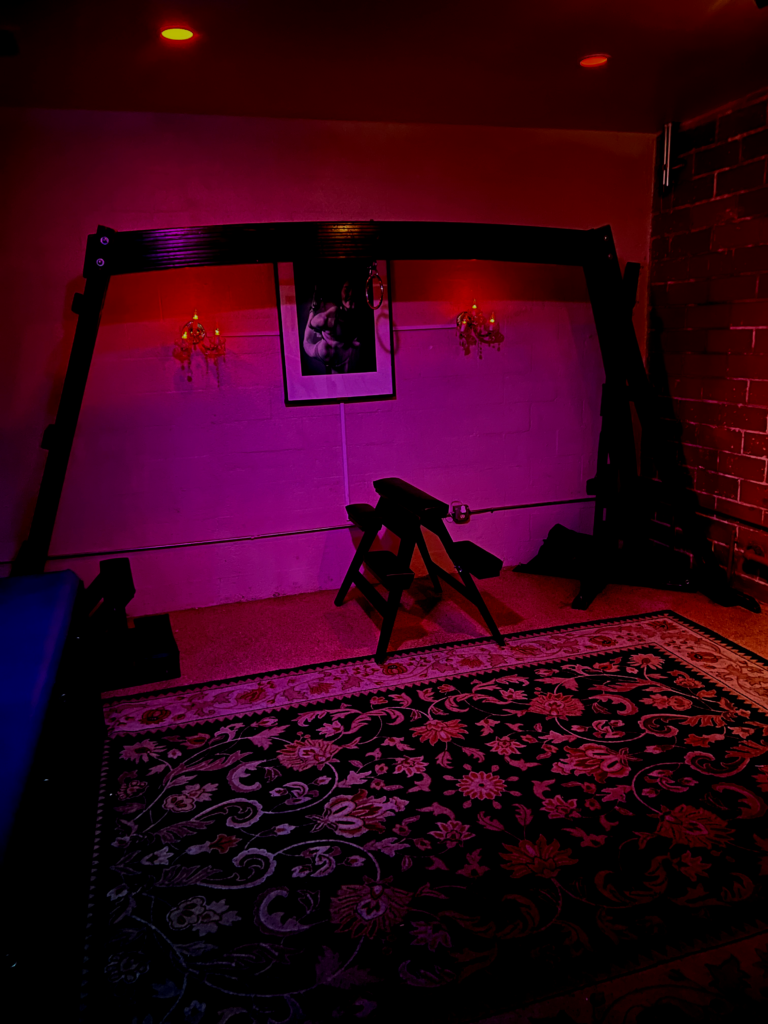 chair in the room with lamp in the wall