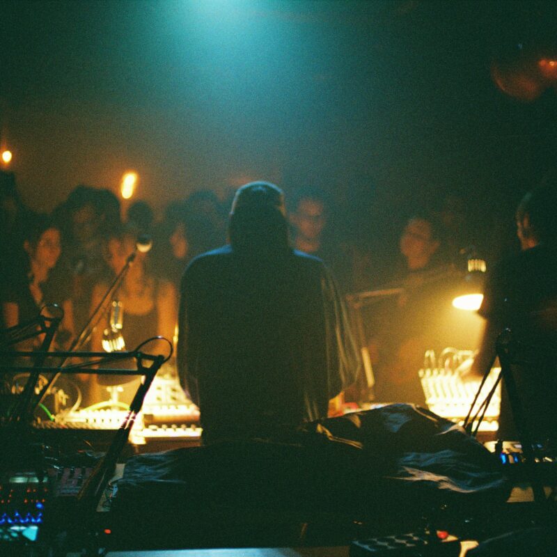 DJ playing music in front of audience