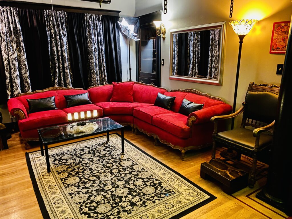 Big red sofa in the reception room