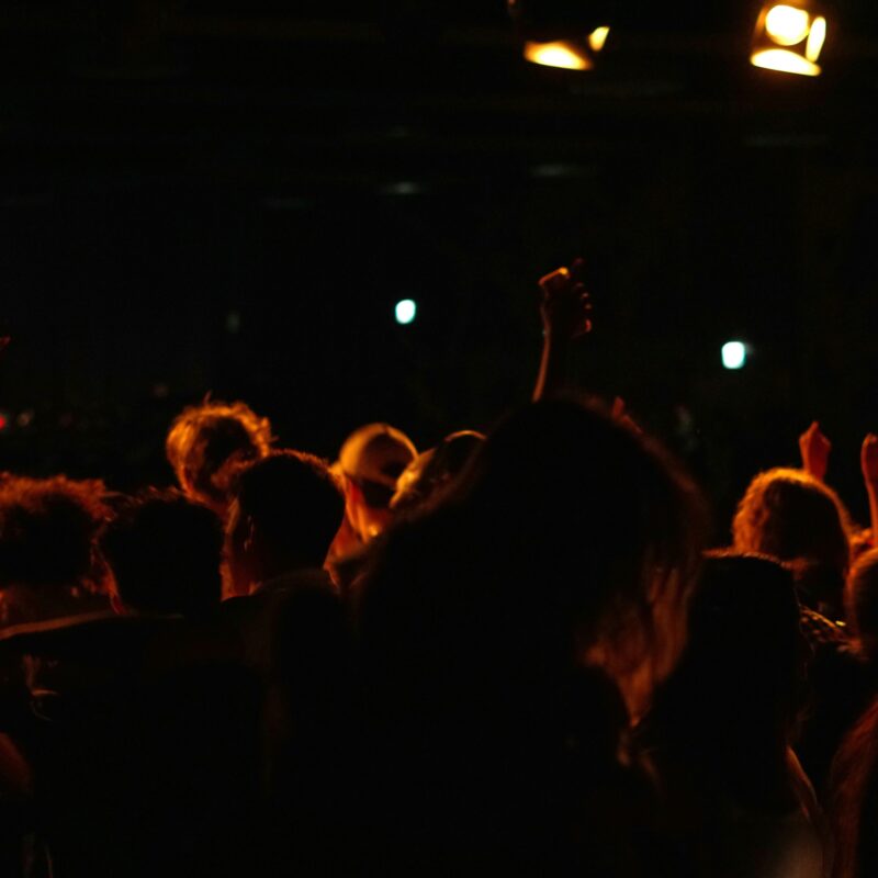 People in the crowd standing