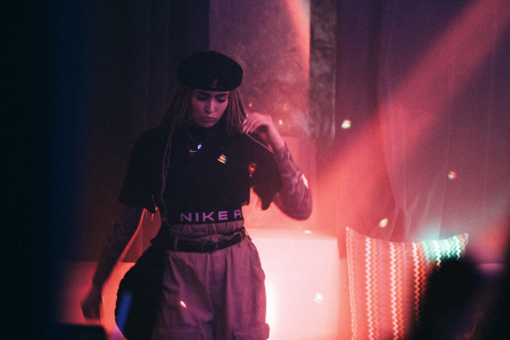 Woman standing in the back