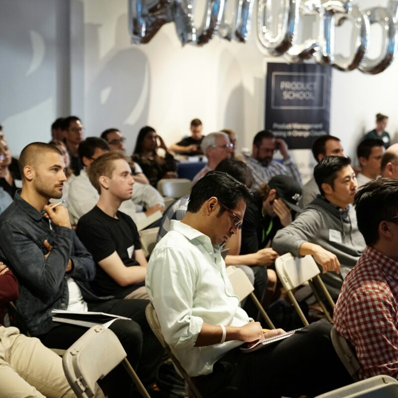 People sitting in the chairs