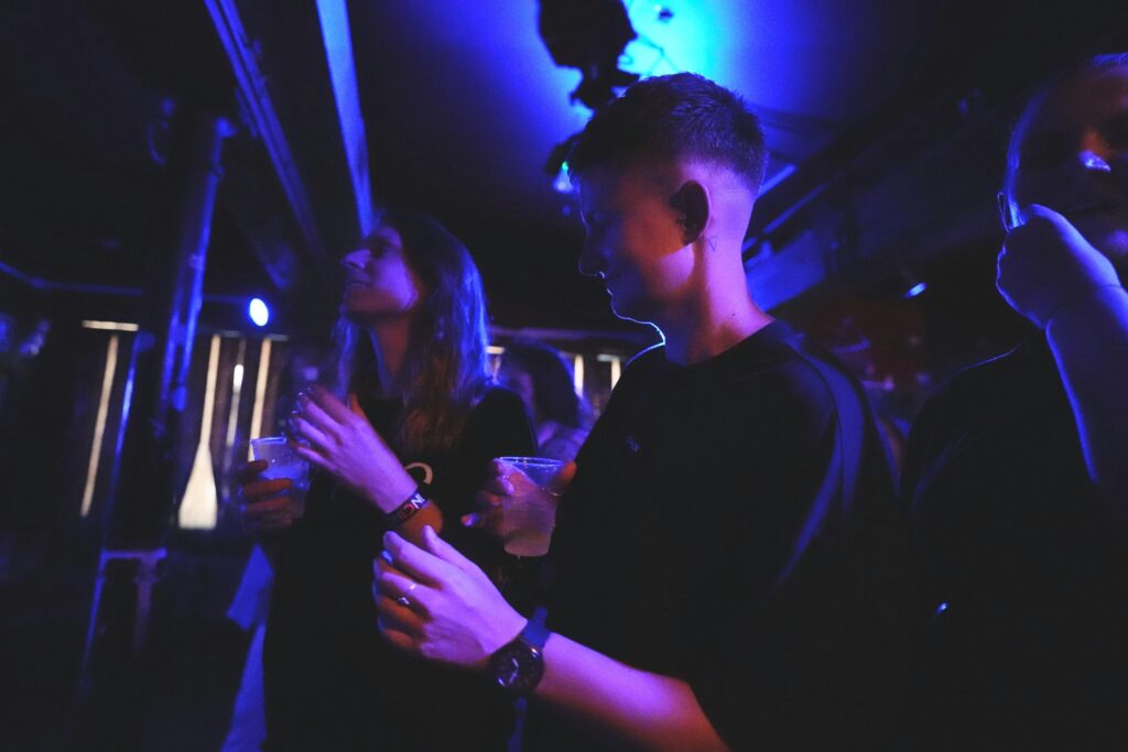 Man standing beside a woman