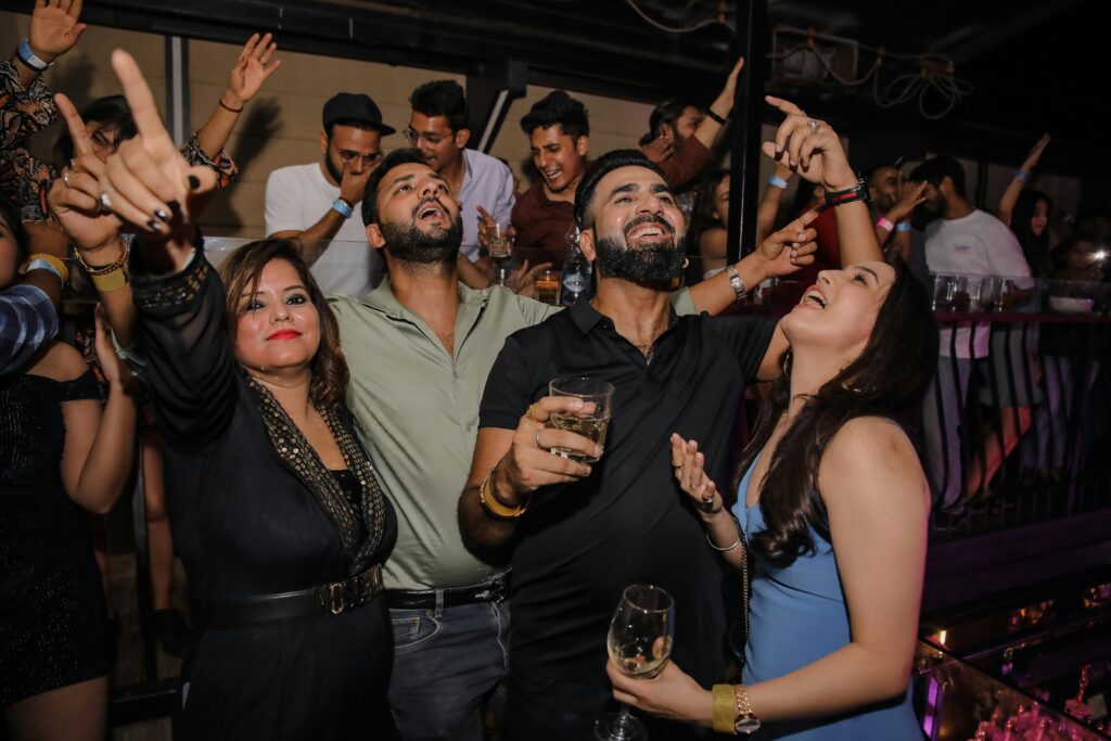 People dancing and drinking