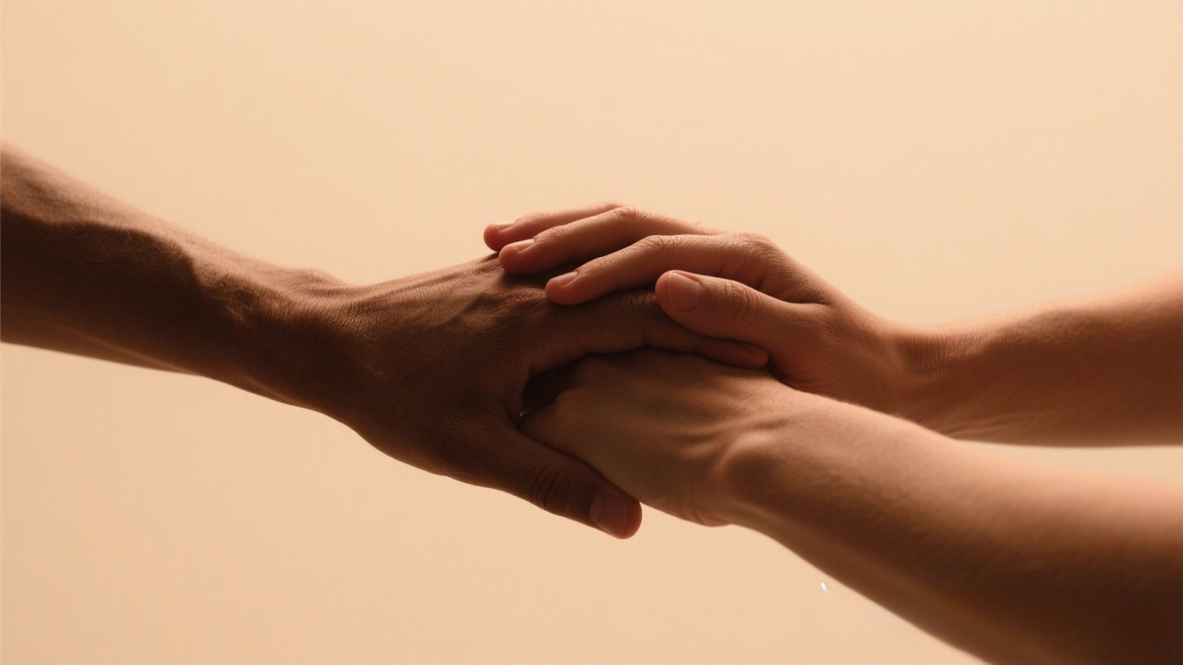 Three hands intertwined in unity, symbolizing throuple relationships.