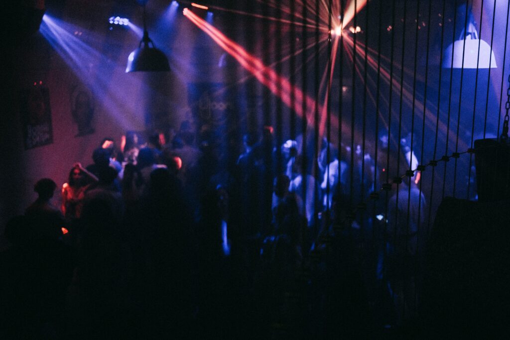 People dancing and standing