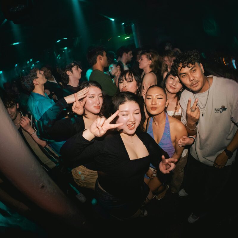 People facing the mirror in the wall