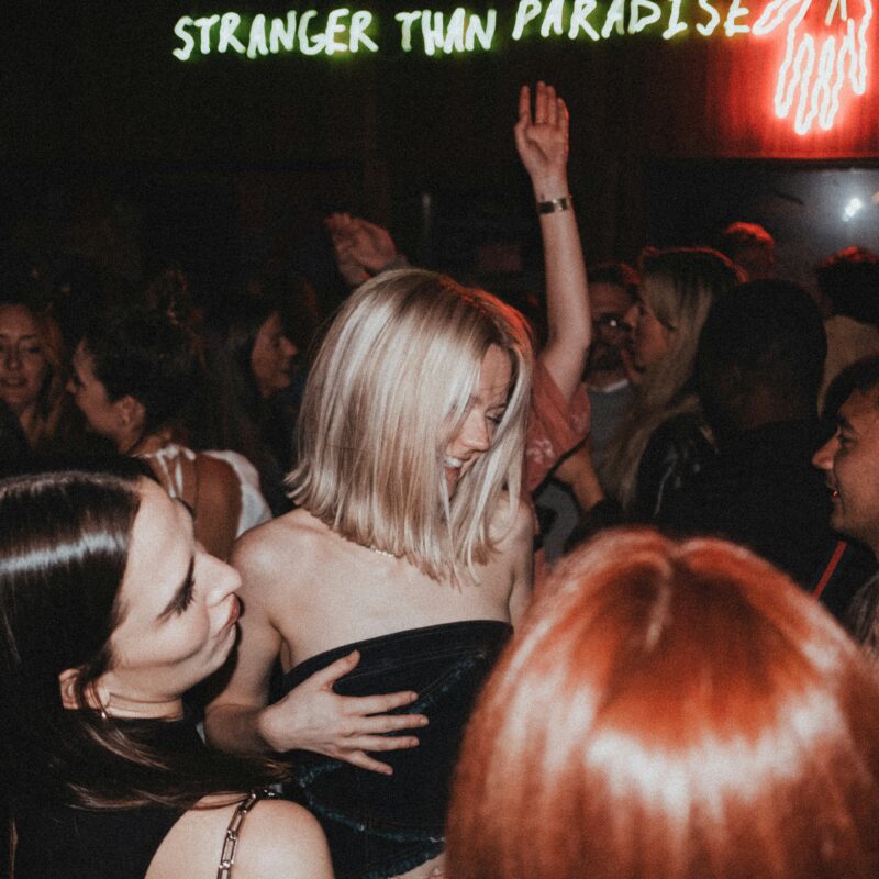 Woman dancing in the crowd