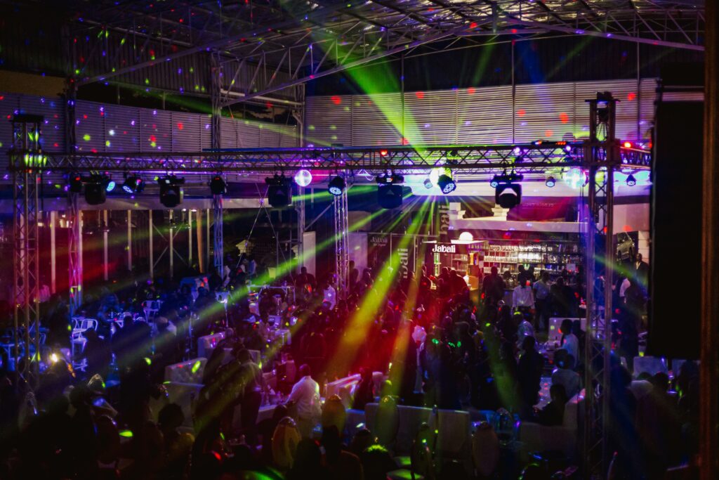 a large crowd of people at a party