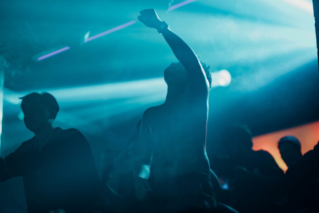 a group of people standing on top of a stage