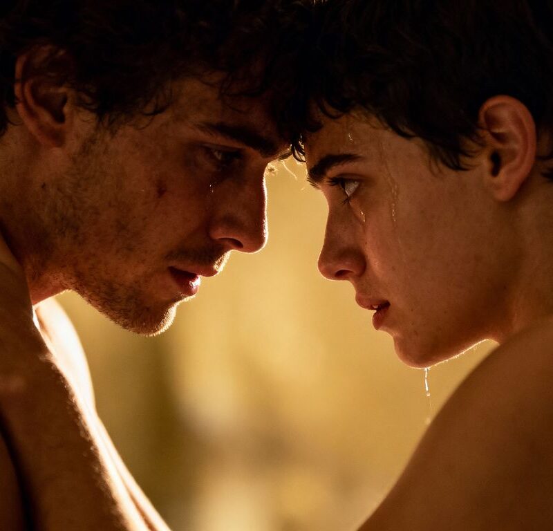 Couple embracing tenderly after an intense scene.