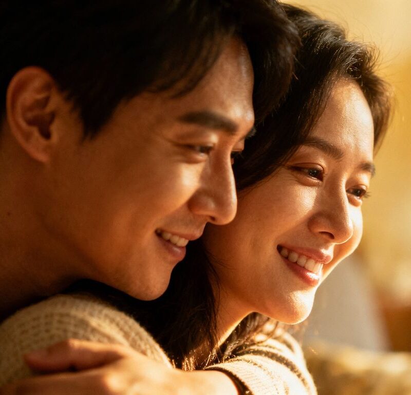 Couple embracing warmly, conveying affection and connection.