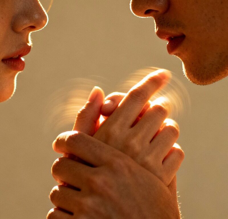 Couple engaging in mutual masturbation, intimate shared pleasure.