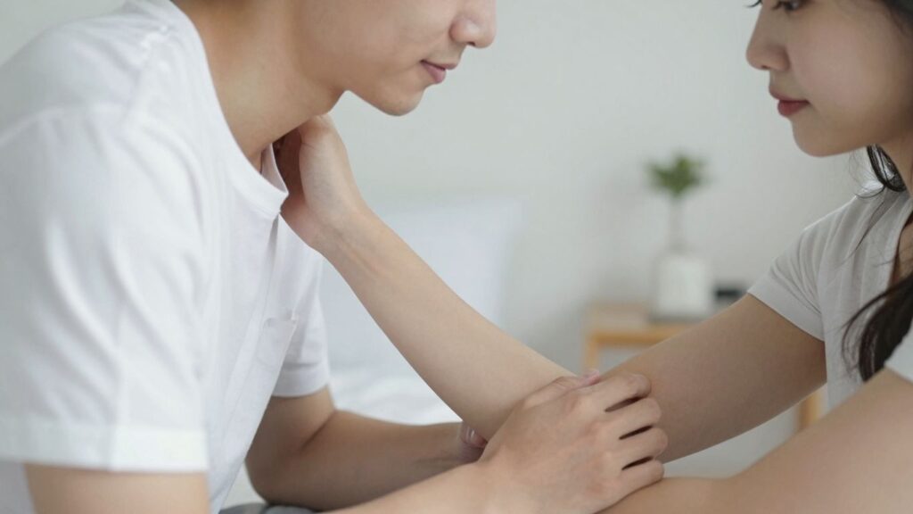 Couple communicating intimacy and trust in a bedroom.