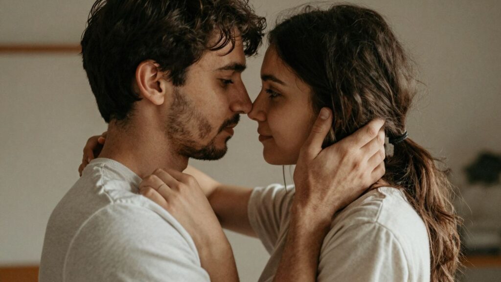 Couple embracing, exploring new relationship dynamics.