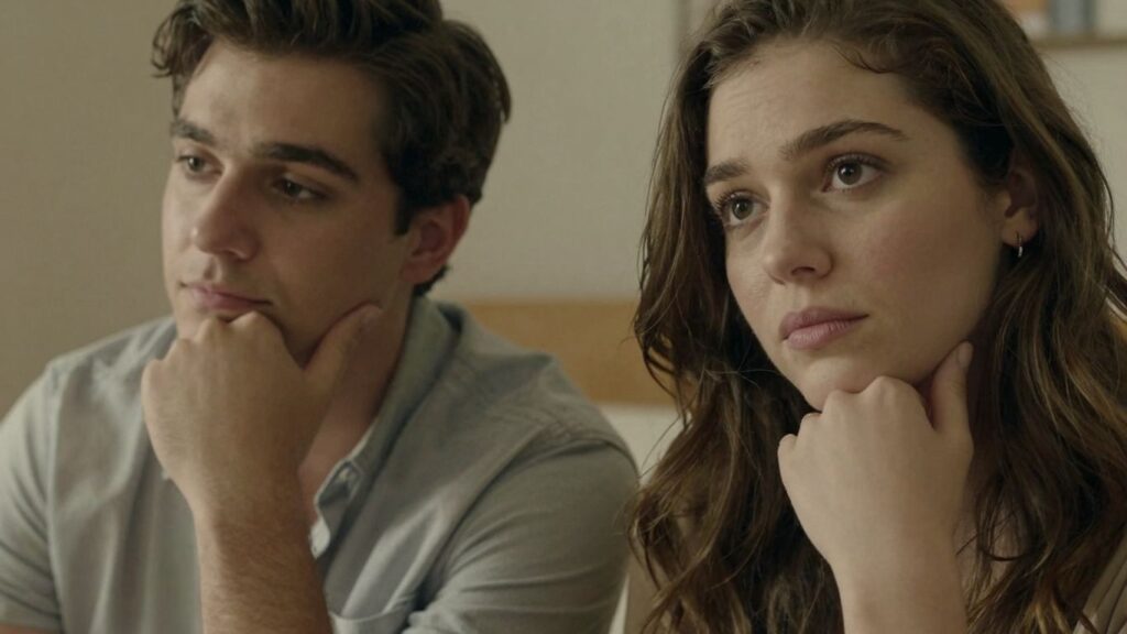 Couple in thoughtful pose, discussing relationships and consent.