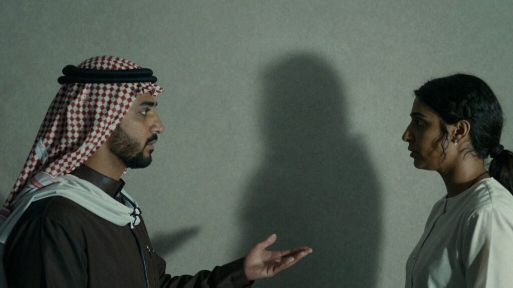 Couple with a shadowy figure, media narratives, wife poacher archetype.